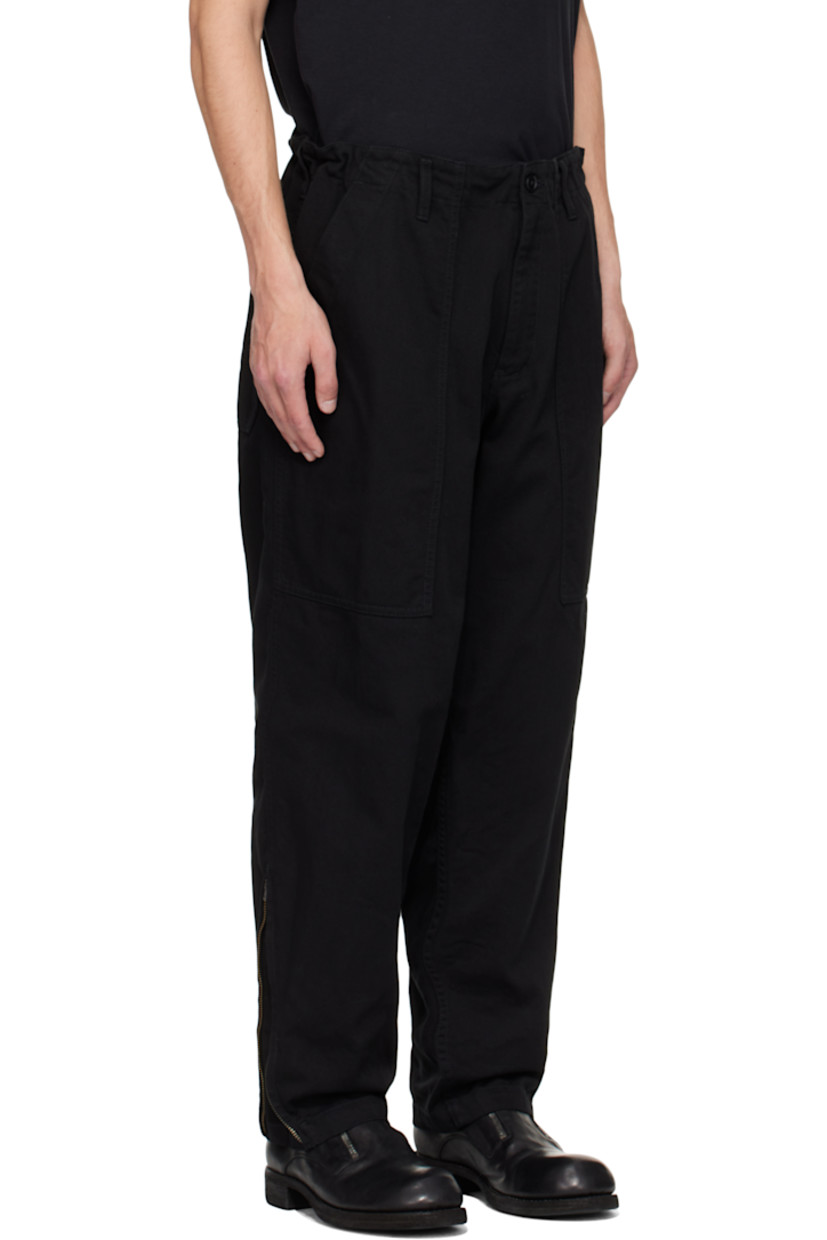 Cotton drill trousers.

· Concealed drawstring at waistband
· Belt loops
· Four-pocket styling
· Zip fly
· Zip expansion panel at cuffs
· Logo flag at back pocket

Part of the Yohji Yamamoto POUR HOMME collection.

Supplier color: Black