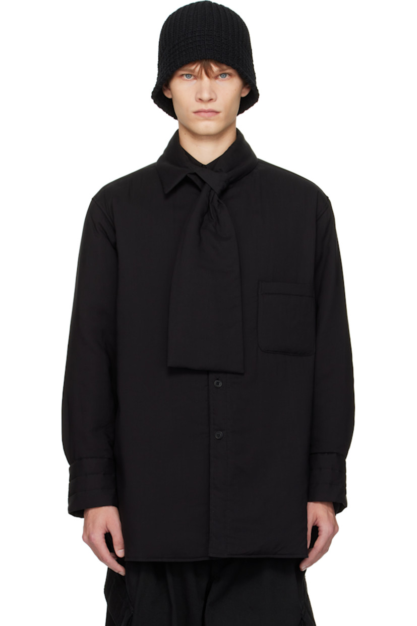 Padded cellulose lawn shirt.

· Modified spread collar
· Button tab and extended trim at collar
· Button closure
· Patch pocket at chest
· Vented shirttail hem
· Quilted and buttoned barrel cuffs

Part of the Yohji Yamamoto POUR HOMME collection.

Supplier color: Black
