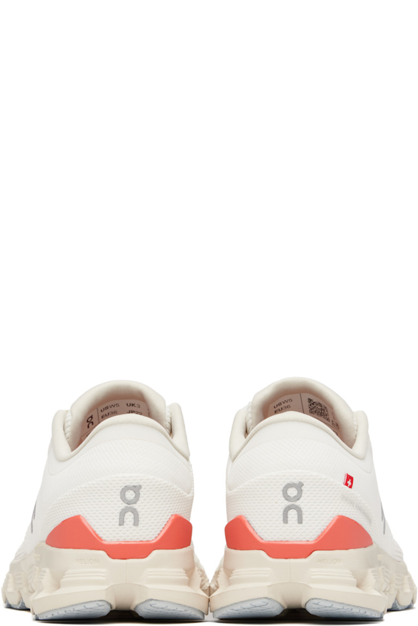 Low-top mesh sneakers in off-white.

· Reflective logo bonded throughout
· Lace-up closure
· Padded tongue and collar
· Flag at heel counter
· Jersey lining
· CloudTec Phase® Helion™ foam rubber midsole
· Treaded Speedboard® rubber sole

Supplier color: Ivory/Salmon