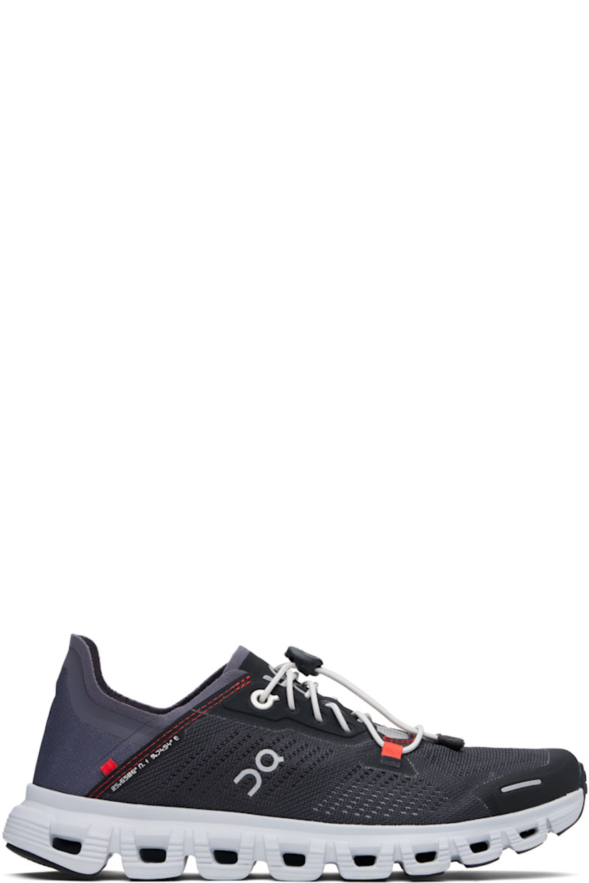 Low-top mesh sneakers in black and navy. 

· Bungee-style lace-up closure
· Logo printed at tongue
· Reflective logo bonded at sides 
· Logo embossed at heel tab
· CloudTec® foam rubber midsole
· Treaded Speedboard® rubber sole

Part of the On x MITA collaboration.

Supplier color: Magnet/Sand