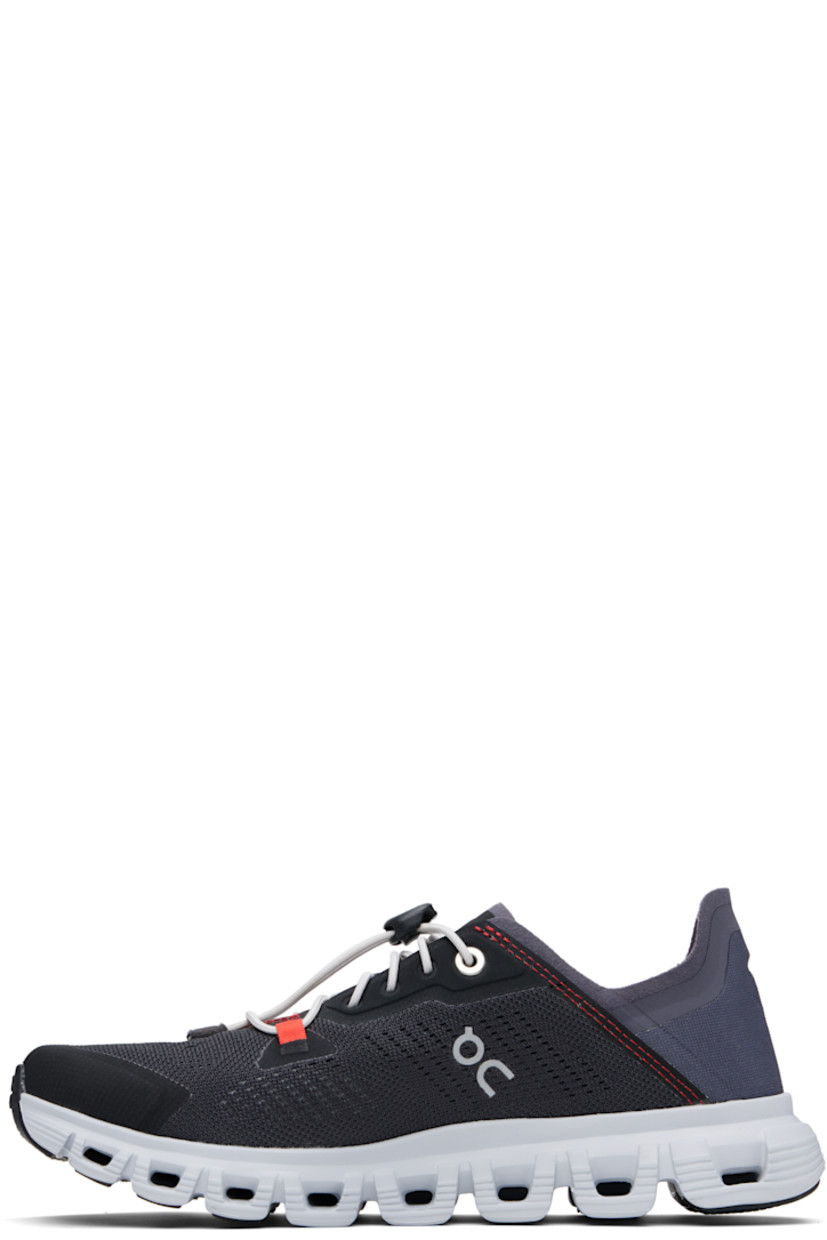 Low-top mesh sneakers in black and navy. 

· Bungee-style lace-up closure
· Logo printed at tongue
· Reflective logo bonded at sides 
· Logo embossed at heel tab
· CloudTec® foam rubber midsole
· Treaded Speedboard® rubber sole

Part of the On x MITA collaboration.

Supplier color: Magnet/Sand