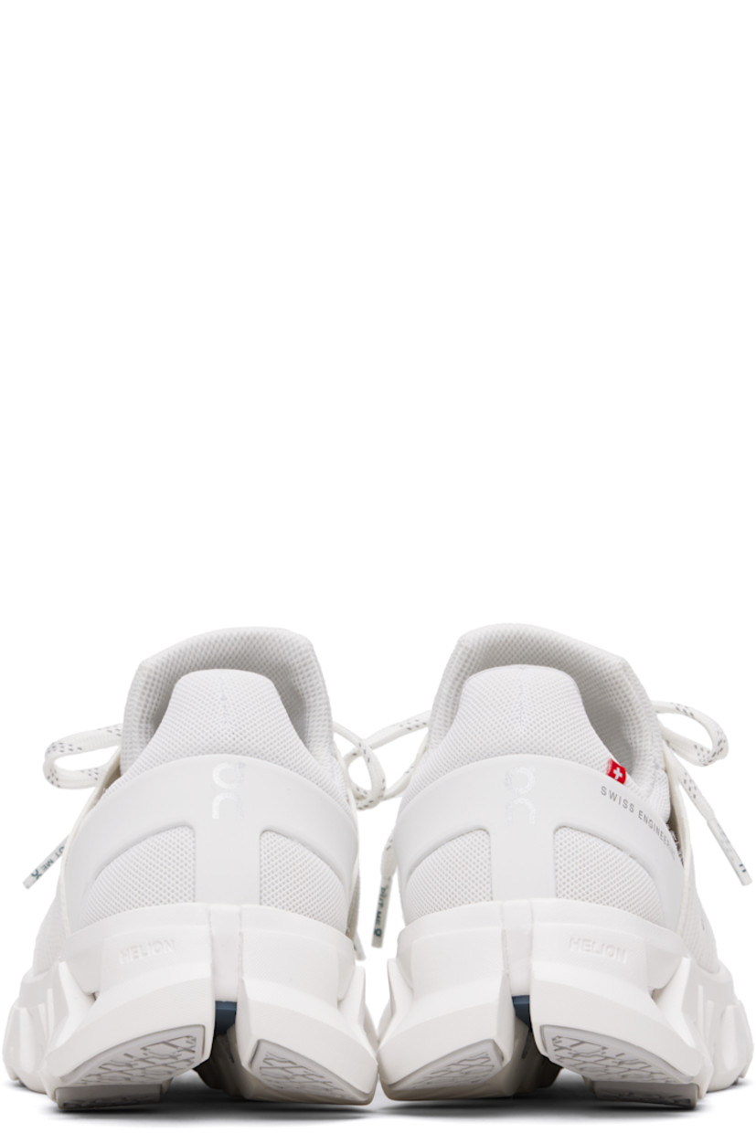 Low-top recycled mesh sneakers. 

· Water-repellent
· Reflective logos bonded throughout
· Lace-up closure
· Padded tongue and collar
· Logo flag and bonded text at outer side
· Jersey and mesh lining
· CloudTec® Helion™ foam rubber midsole
· Treaded Speedboard™ rubber sole

Supplier color: White/White
