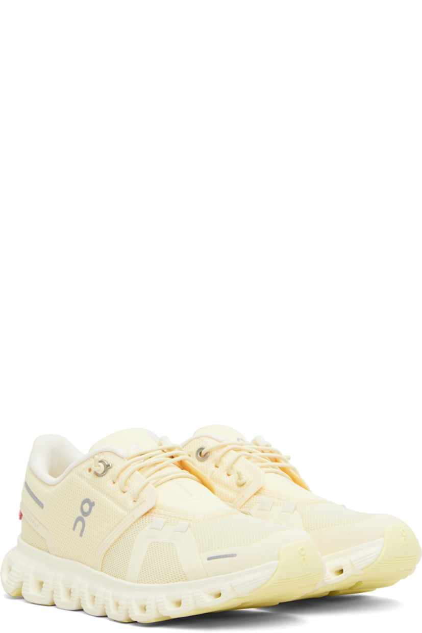 Low-top recycled mesh sneakers.

· Reflective logos and bonded trim throughout
· Lace-up closure
· Padded tongue and collar
· Mesh lining
· Cushioned Zero-Gravity CloudTec® foam rubber midsole
· Treaded Speedboard® rubber sole

Supplier color: Castor/Ivory