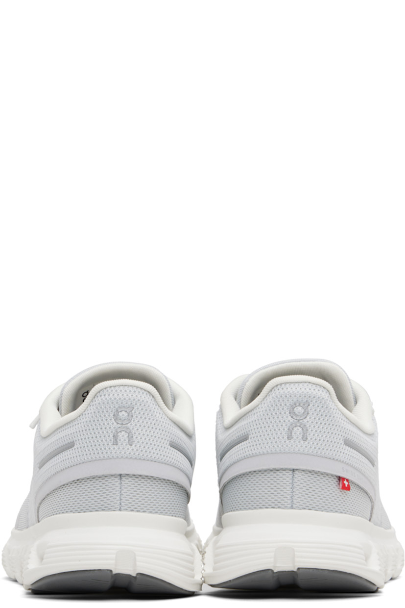 Low-top recycled mesh sneakers.

· Reflective logos and bonded trim throughout
· Lace-up closure
· Padded tongue and collar
· Mesh lining
· Cushioned Zero-Gravity CloudTec® foam rubber midsole
· Treaded Speedboard® rubber sole

Supplier color: Glacier/White