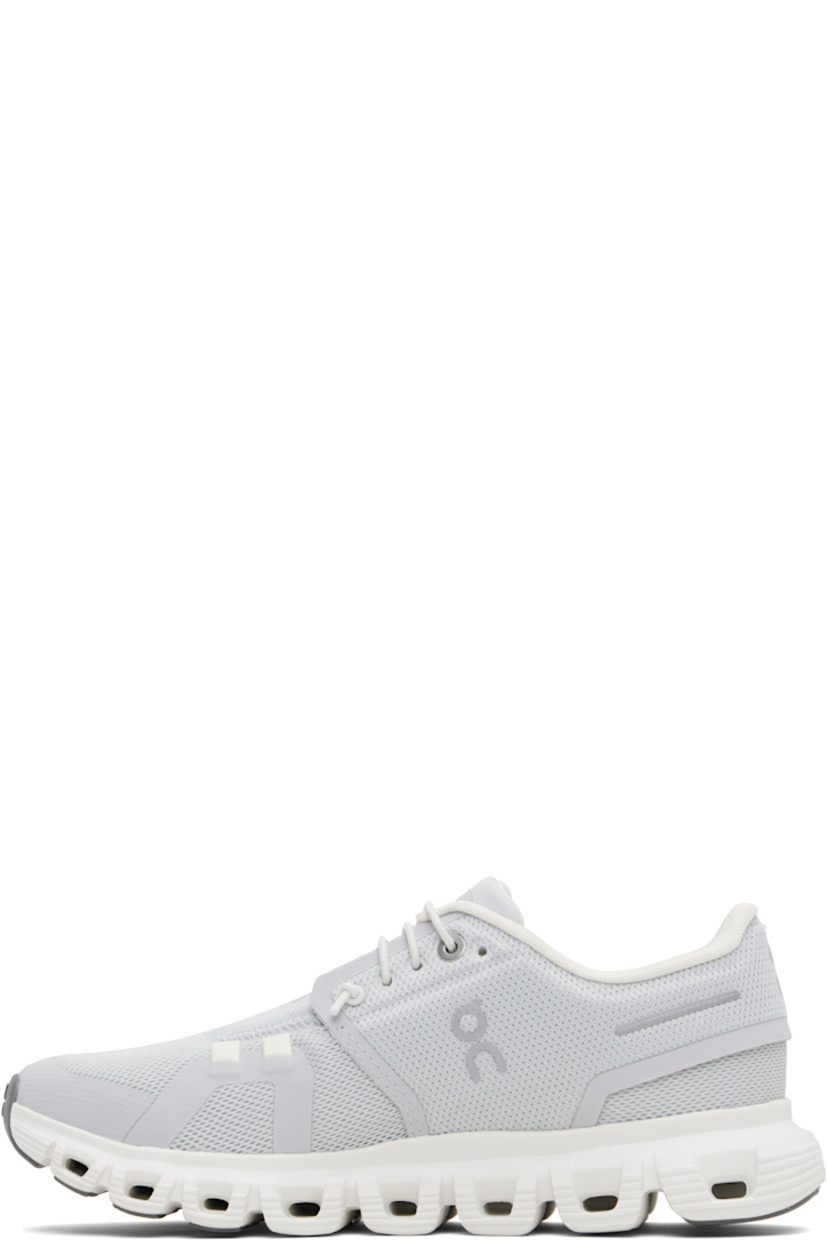 Low-top recycled mesh sneakers.

· Reflective logos and bonded trim throughout
· Lace-up closure
· Padded tongue and collar
· Mesh lining
· Cushioned Zero-Gravity CloudTec® foam rubber midsole
· Treaded Speedboard® rubber sole

Supplier color: Glacier/White