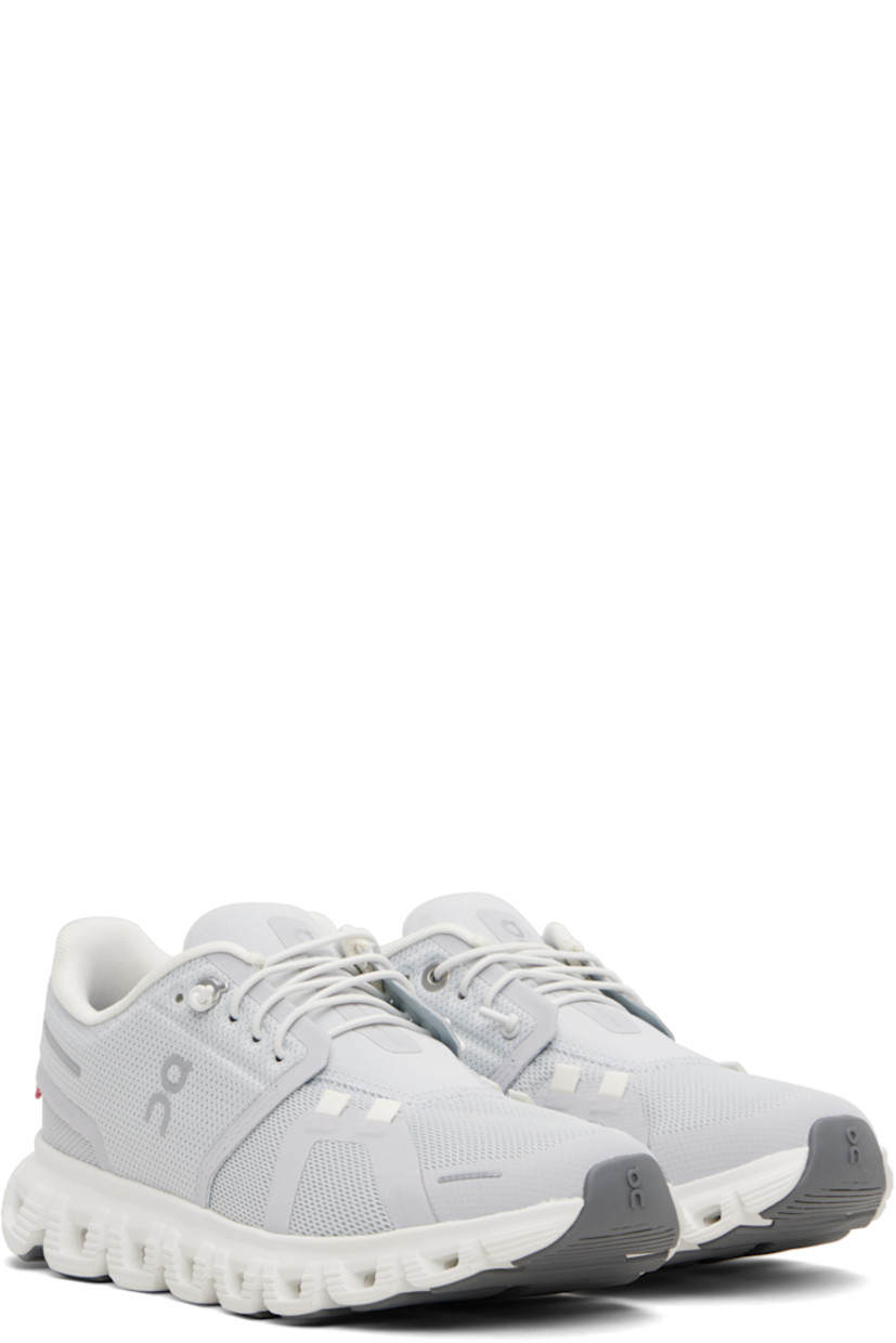 Low-top recycled mesh sneakers.

· Reflective logos and bonded trim throughout
· Lace-up closure
· Padded tongue and collar
· Mesh lining
· Cushioned Zero-Gravity CloudTec® foam rubber midsole
· Treaded Speedboard® rubber sole

Supplier color: Glacier/White