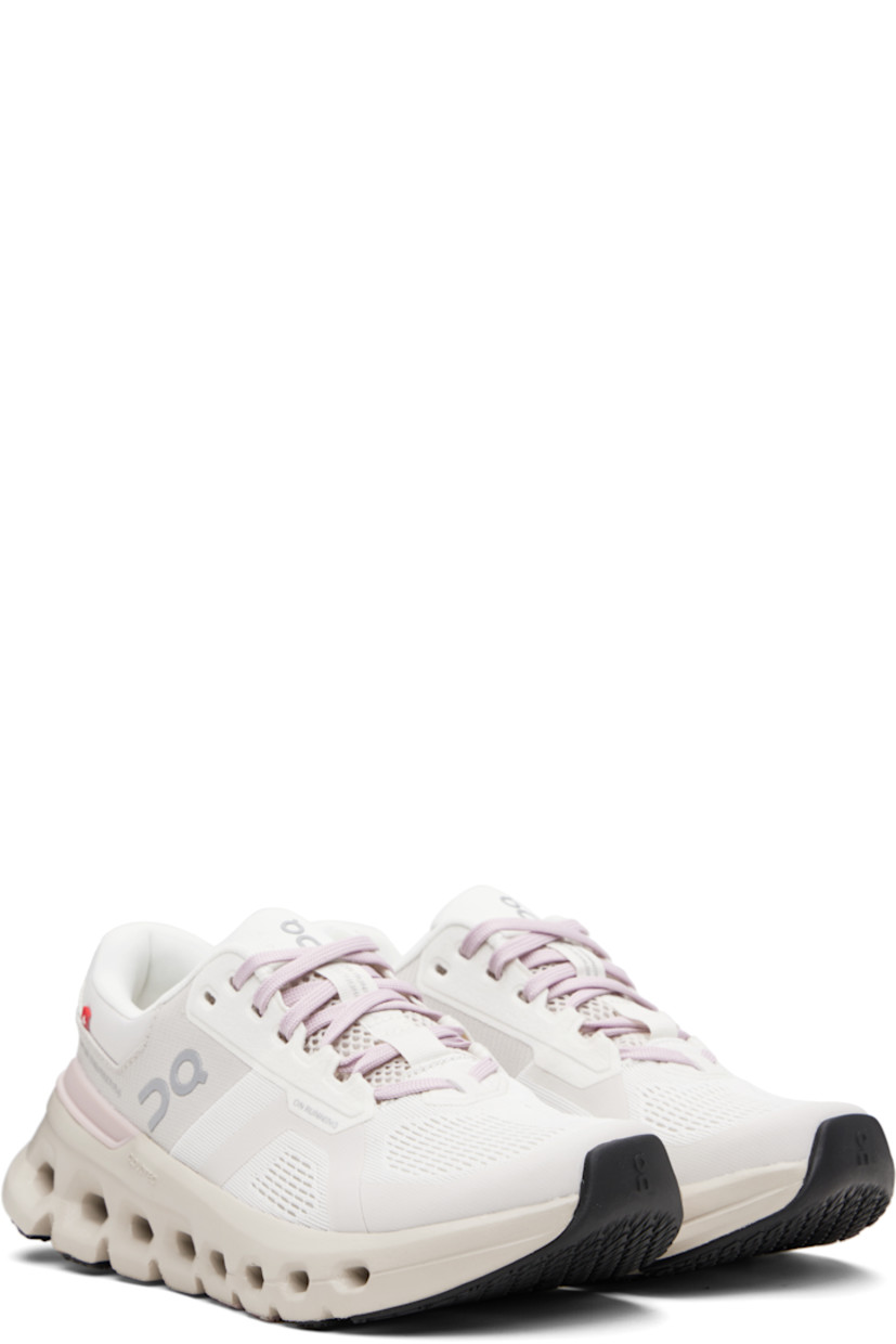 Low-top waterproof ripstop sneakers.

· Reflective logos bonded throughout
· Lace-up closure
· Padded tongue and collar
· Reflective trim at heel tab
· Jersey lining
· Cushioned CloudTec® Helion™ foam rubber midsole
· Treaded rubber sole

Supplier color: Silver/Mauve