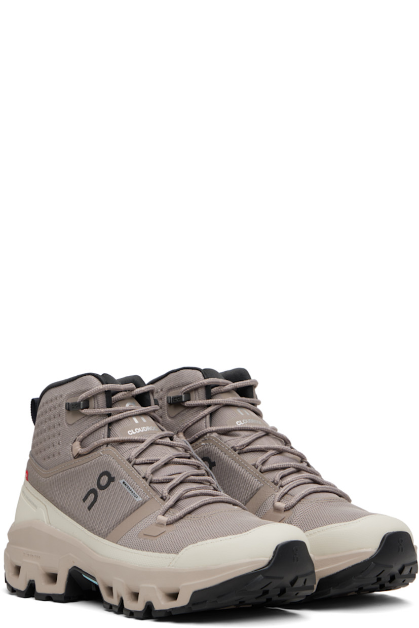 Mid-top recycled mesh sneakers.

· Waterproof
· Logo embossed at toe
· Lace-up closure
· Reflective logo printed at padded tongue
· Padded collar
· Logo bonded at sides and heel counter
· Pull-loop at heel collar
· Jersey lining
· Cushioned CloudTec® Helion™ superfoam rubber midsole
· Treaded Missiongrip™ and Speedboard® rubber sole

Supplier color: Cinder/Desert