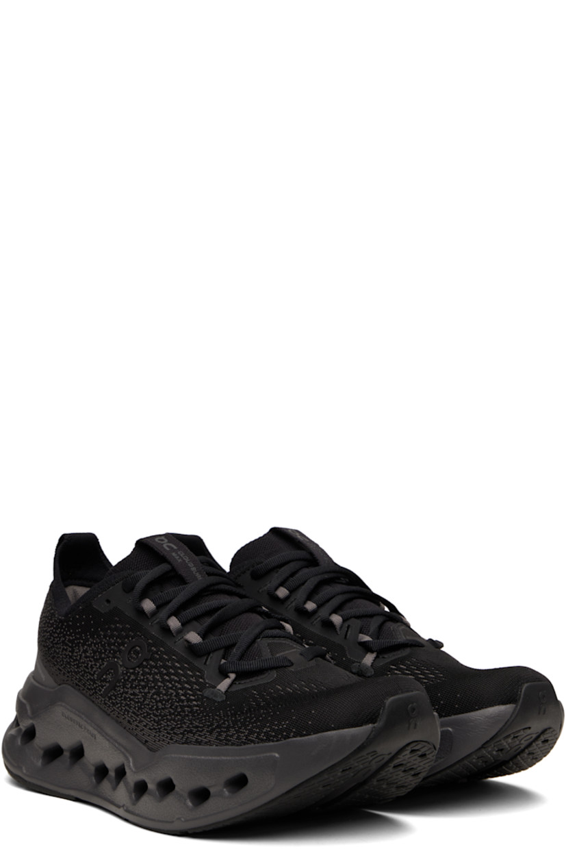 Low-top knit sneakers.

· Jacquard pattern throughout
· Lace up closure
· Logo bonded at sides
· Logo bonded at tongue, collar, and sides 
· Pull loop at tongue and heel tab
· Padded collar
· Helion™ foam rubber midsole
· Treaded CloudTec Phase® rubber sole 

Supplier color: Black/Eclipse