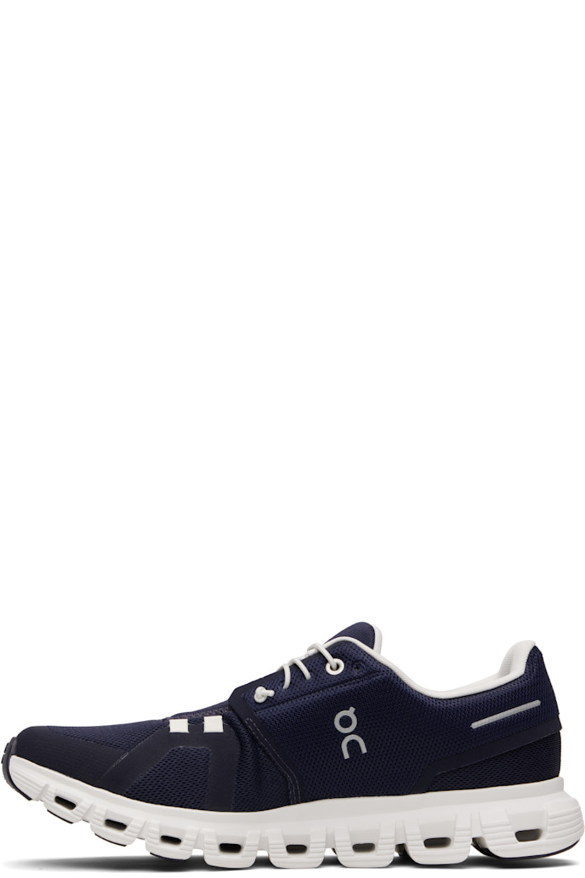 Low-top recycled mesh sneakers.

· Reflective trim and logos bonded throughout
· Elasticized lace-up closure
· Padded tongue and collar
· Zero-Gravity CloudTec® foam rubber midsole
· Treaded Speedboard® rubber sole

Supplier color: Midnight/White