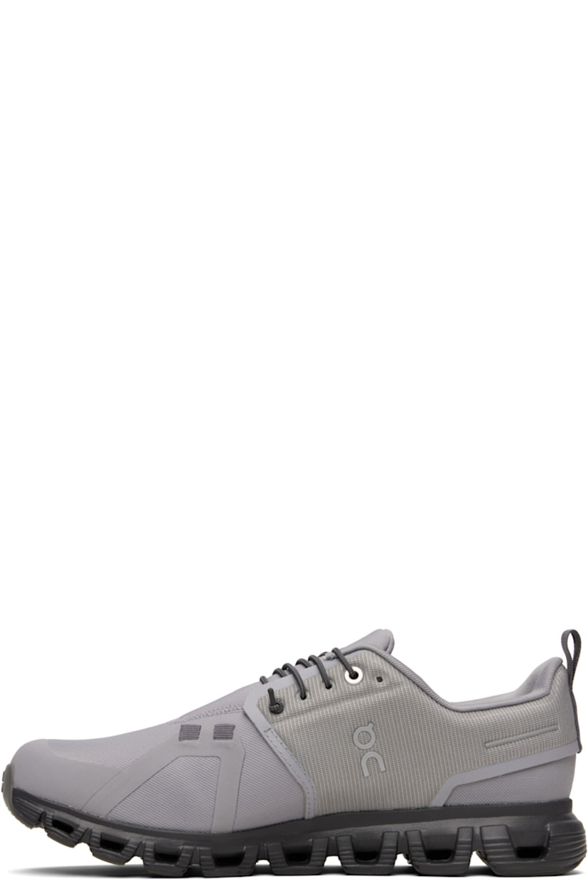 Low-top recycled mesh sneakers.

· Waterproof and dope-dyed
· Bonded and reflective trim throughout
· Elasticized lace-up closure
· Logo patch at padded tongue
· Padded collar
· Reflective bonded logo at sides
· Logo-bonded pull-loop at heel tab
· Mesh lining
· Zero-Gravity CloudTec® foam rubber midsole
· Treaded Speedboard® rubber sole

Supplier color: Alloy/Wolf