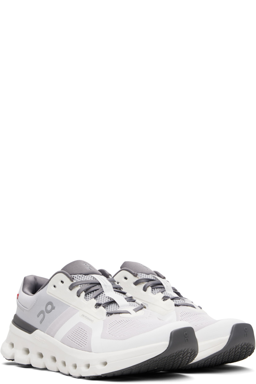 Low-top recycled mesh sneakers.

· Reflective logos and bonded trim throughout
· Lace-up closure
· Padded tongue and collar
· Cushioned CloudTec® Helion™ foam rubber midsole
· Treaded rubber sole

Supplier color: Frost/White