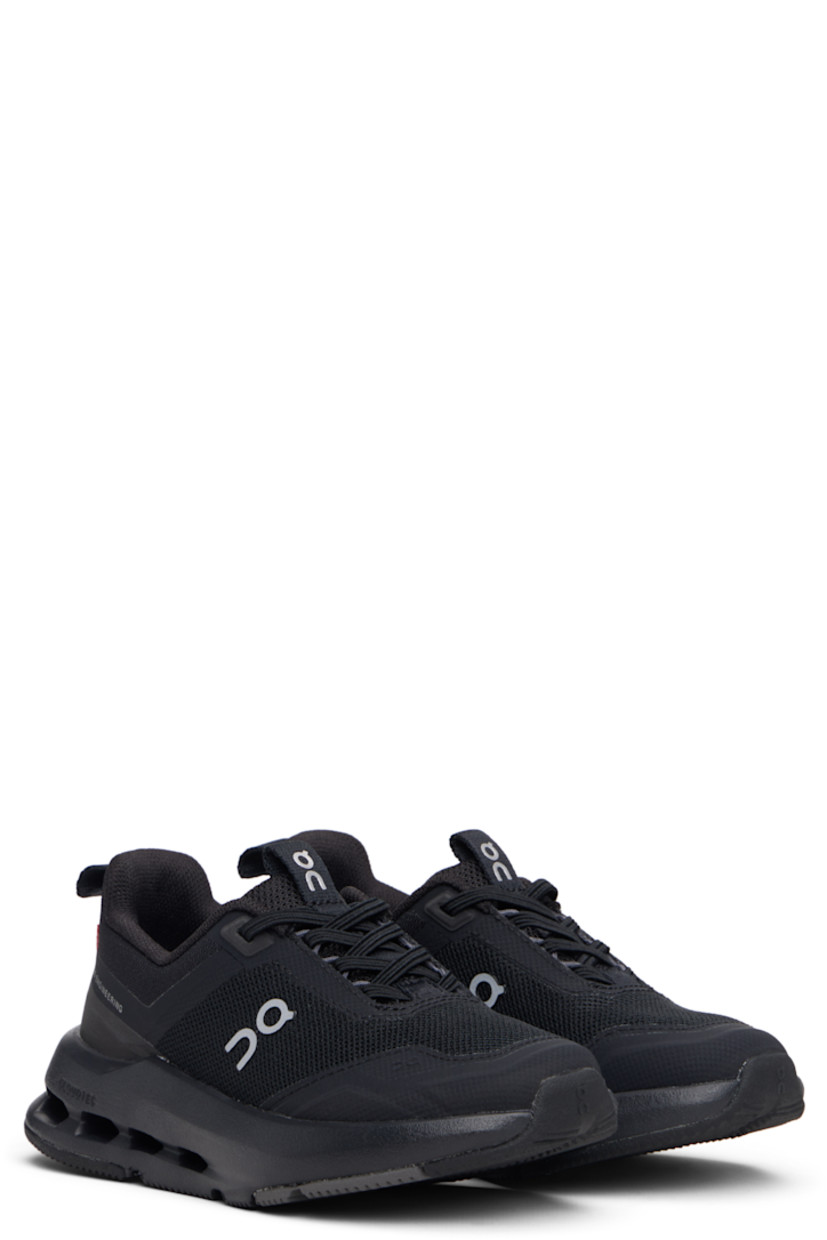 Low-top lightweight knit and recycled mesh sneakers.

· Reflective logos bonded throughout
· Logo-embossed rubber cap toe
· Lace-up closure
· Pull-loop at tongue and collar
· Padded collar
· Mesh lining
· Cushioned CloudTec® foam rubber midsole
· Treaded rubber sole

Supplier color: Black/Eclipse

On Running US size: child's foot length
3.5Y: 8.5" / 21.6 cm
4Y: 8.7" / 22 cm
4.5Y: 8.8" / 22.4 cm
5Y: 9" / 22.9 cm
5.5Y: 9.2" / 23.3 cm
6Y: 9.3" / 23.7 cm
6.5Y: 9.5" / 24.1 cm