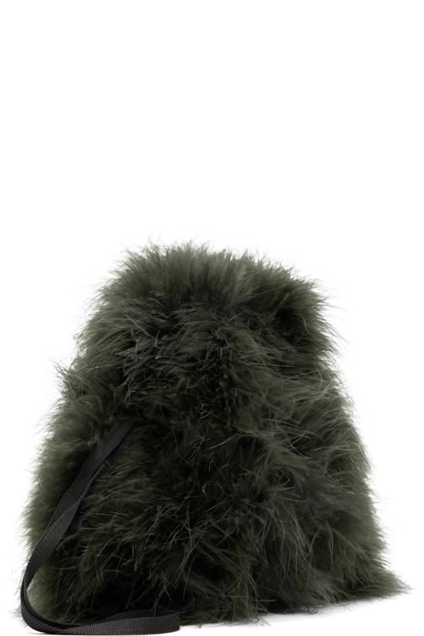 Turkey feather pouch.

· Twin carry handles
· Drawstring closure at throat
· Card slot at interior
· Plain-woven lining
· H9" x W9"

Supplier color: Amazone

Body: 100% turkey feather.