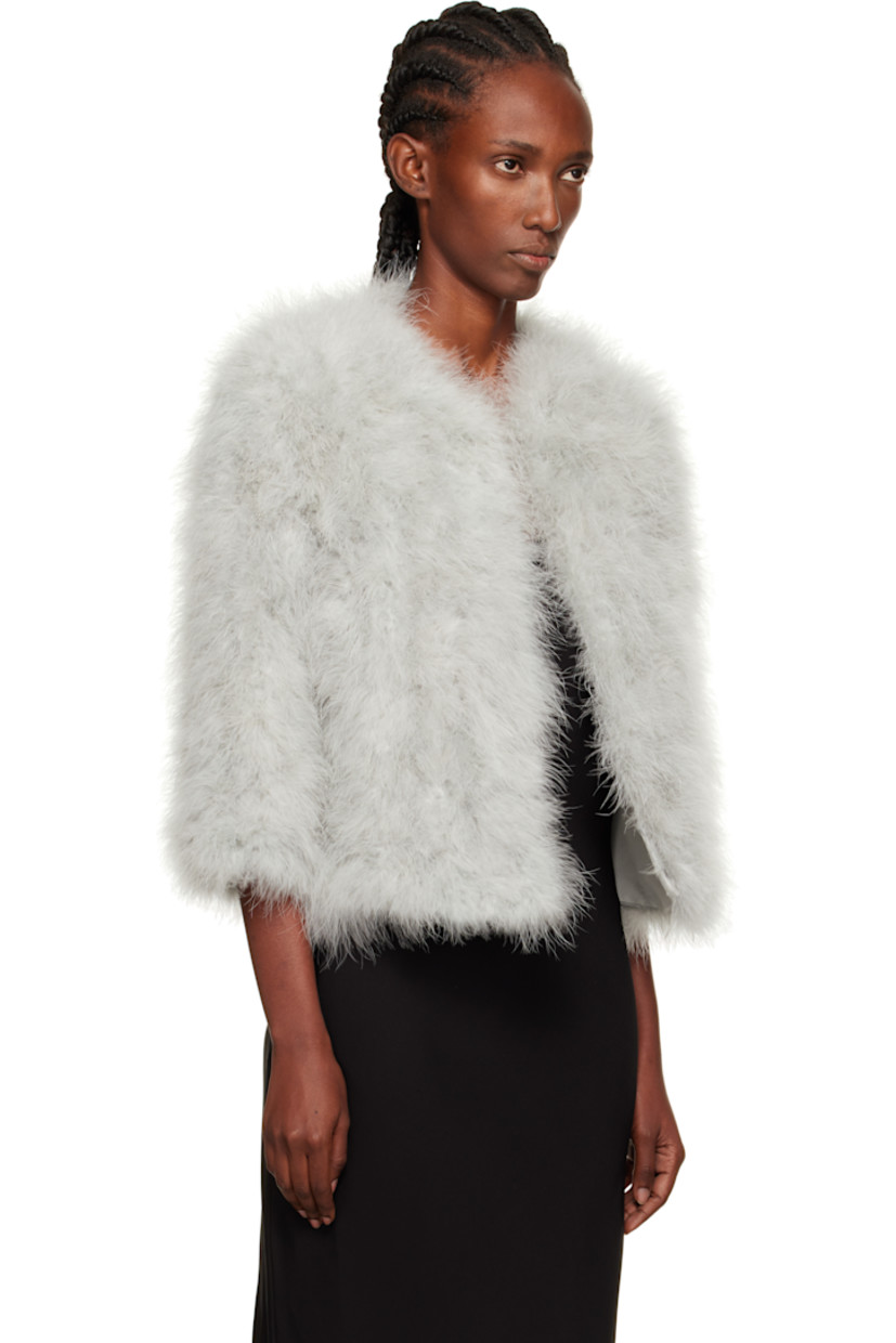 Lightweight turkey feather jacket.

· Round neck
· Hook-eye closure
· Welt pockets
· Cropped hem
· Three-quarter sleeves
· Full silk satin lining

Supplier color: Vancouver

Body: 100% turkey feather.