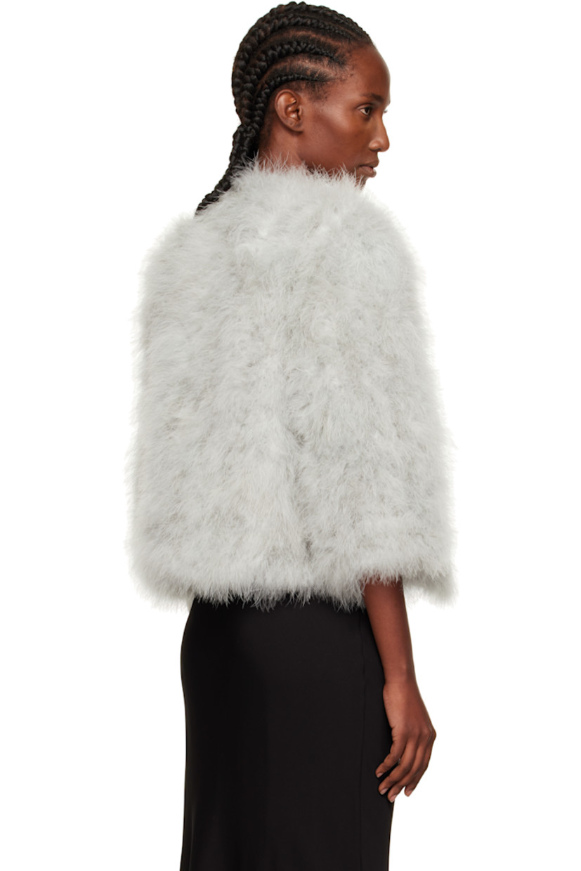 Lightweight turkey feather jacket.

· Round neck
· Hook-eye closure
· Welt pockets
· Cropped hem
· Three-quarter sleeves
· Full silk satin lining

Supplier color: Vancouver

Body: 100% turkey feather.