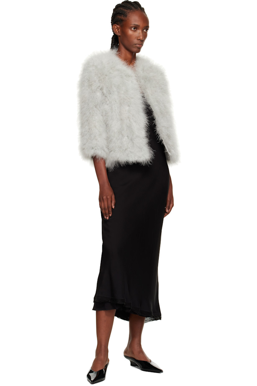Lightweight turkey feather jacket.

· Round neck
· Hook-eye closure
· Welt pockets
· Cropped hem
· Three-quarter sleeves
· Full silk satin lining

Supplier color: Vancouver

Body: 100% turkey feather.