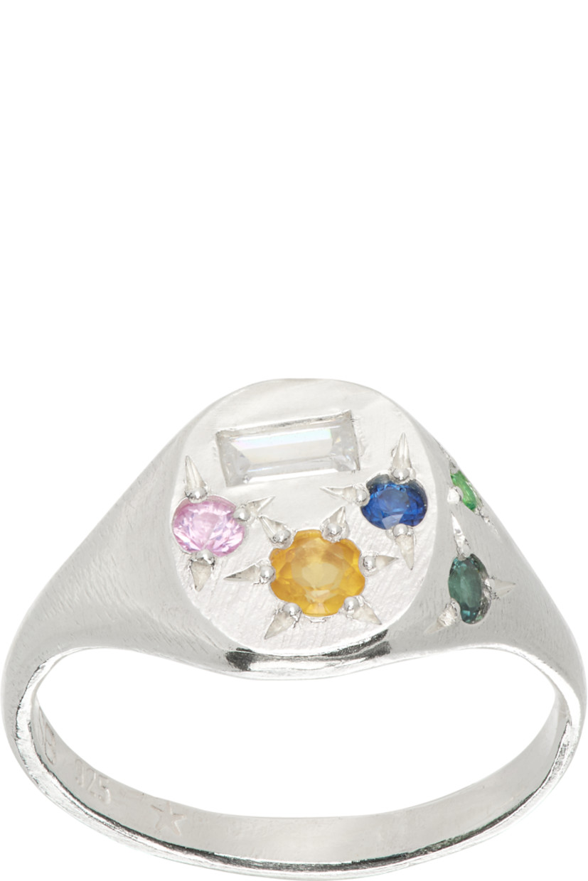 Signet ring in sterling silver.

· Bezel-set sapphires, citrine, and green tsavorite garnet
· Hallmarking at inner band

Supplier color: Sterling silver (925)