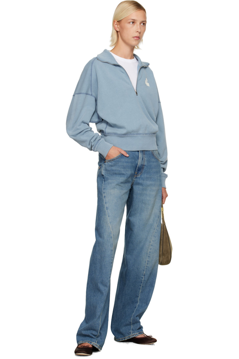 Organic cotton- and recycled polyester-blend French terry sweatshirt. 

· Fading throughout 
· Rib-knit stand collar, hem, and cuffs
· Half-zip closure 
· Flocked logo at chest
· Dropped shoulders

Supplier color: Slate blue/Ecru