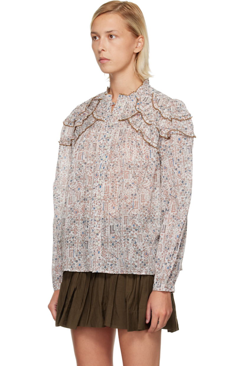 Semi-sheer cotton poplin blouse.

· Graphic pattern printed throughout
· Lace trim at round neck
· Button closure
· Panels with lace trim at shoulders
· Gathering at cuffs and back yoke
· Button fastening at cuffs

Supplier color: Ecru