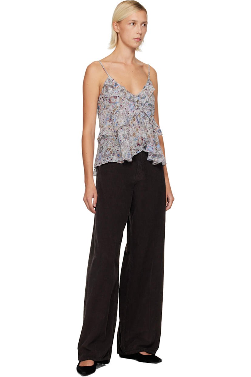 Semi-sheer viscose georgette top. 

· Floral pattern printed throughout 
· V-neck
· Concealed hook-eye placket at chest
· Handkerchief hem 
· Fixed spaghetti shoulder straps

Supplier color: Ecru