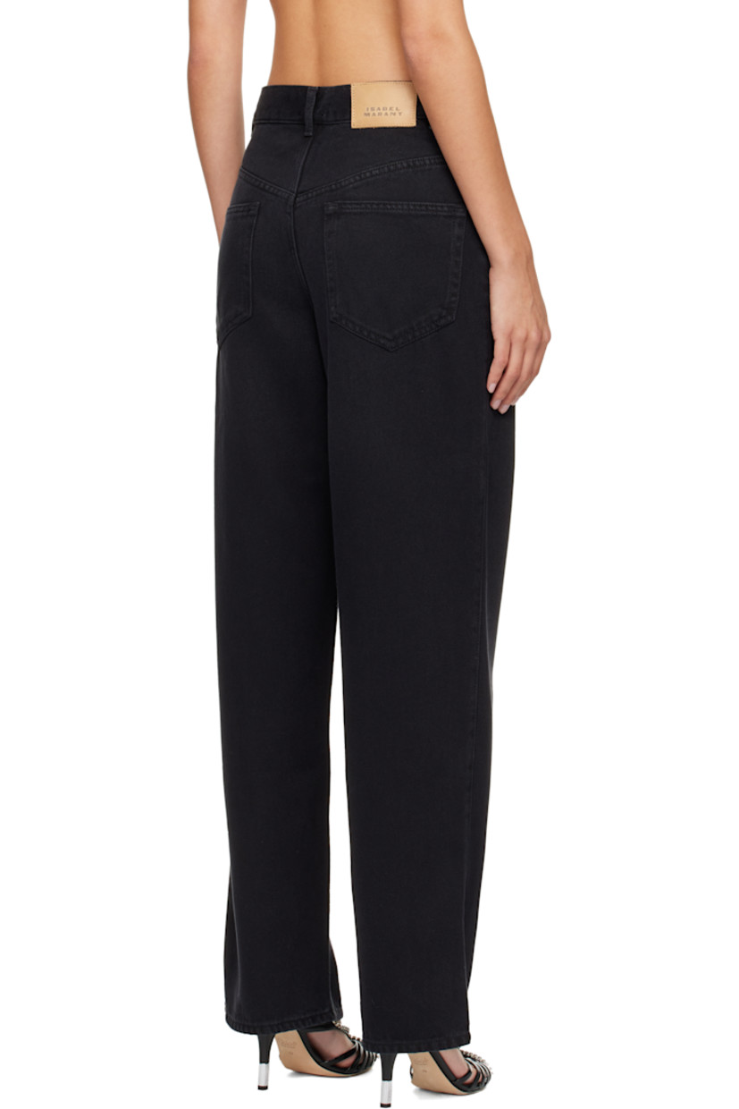 Non-stretch lyocell- and cotton-blend denim jeans.

· Fading throughout
· Loose-fit
· Mid-rise
· Belt loops
· Five-pocket styling
· Zip fly
· Logo patch at back waistband

Supplier color: Faded black