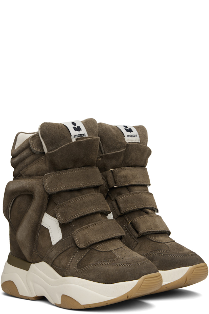 High-top calfskin suede sneakers.

· Perforated detailing at toe
· Velcro closure
· Logo patch at padded tongue
· Quilted padded collar
· Cutout and logo appliqué at sides
· Logo embossed at heel counter
· Grained leather lining
· Concealed wedge heel
· Treaded rubber platform sole
· Platform: H2"
· Heel: H4"

Supplier color: Khaki/Ecru