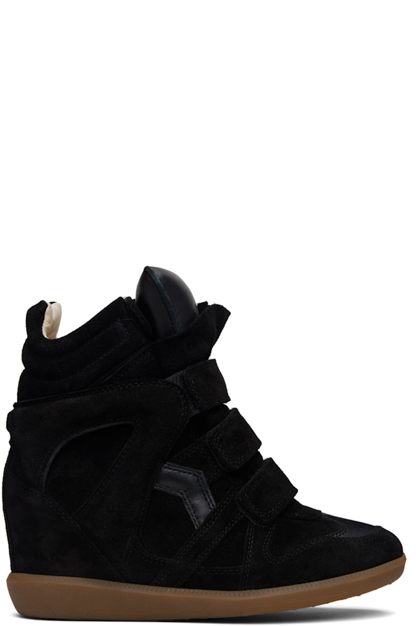 High-top calfskin suede sneakers.

· Perforated detailing at toe
· Velcro closure
· Padded tongue
· Quilted padded collar
· Cutout and logo appliqué at sides
· Logo embossed at heel counter
· Grained leather lining
· Concealed wedge heel
· Treaded rubber sole
· Heel: H3.25"

Supplier color: Black