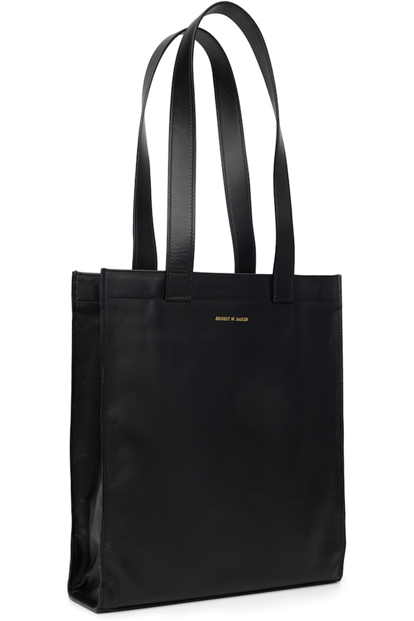 Buffed lambskin tote.

· Fixed shoulder straps
· Graphic printed at face
· Logo stamp at back face
· Patch pocket at interior
· Twill lining
· H14" x W12" x D3.25"

Supplier color: Floral black leather