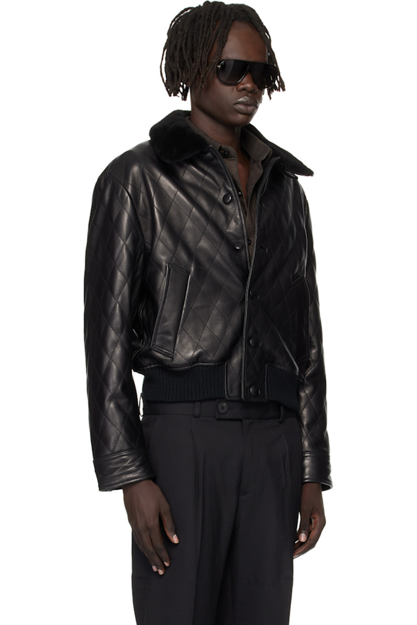 Quilted grained lambskin bomber jacket. 

· Detachable shearling spread collar 
· Button closure
· Welt pockets at waist
· Rib-knit hem 
· Buttoned barrel cuffs
· Welt pocket at interior 
· Full satin twill lining

Supplier color: Black
