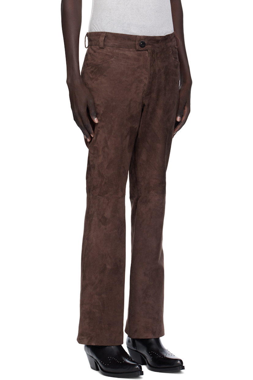 Suede trousers. 

· Flared 
· Belt loops
· Four-pocket styling
· Zip fly 
· Partial satin lining 

Supplier color: Brown suede