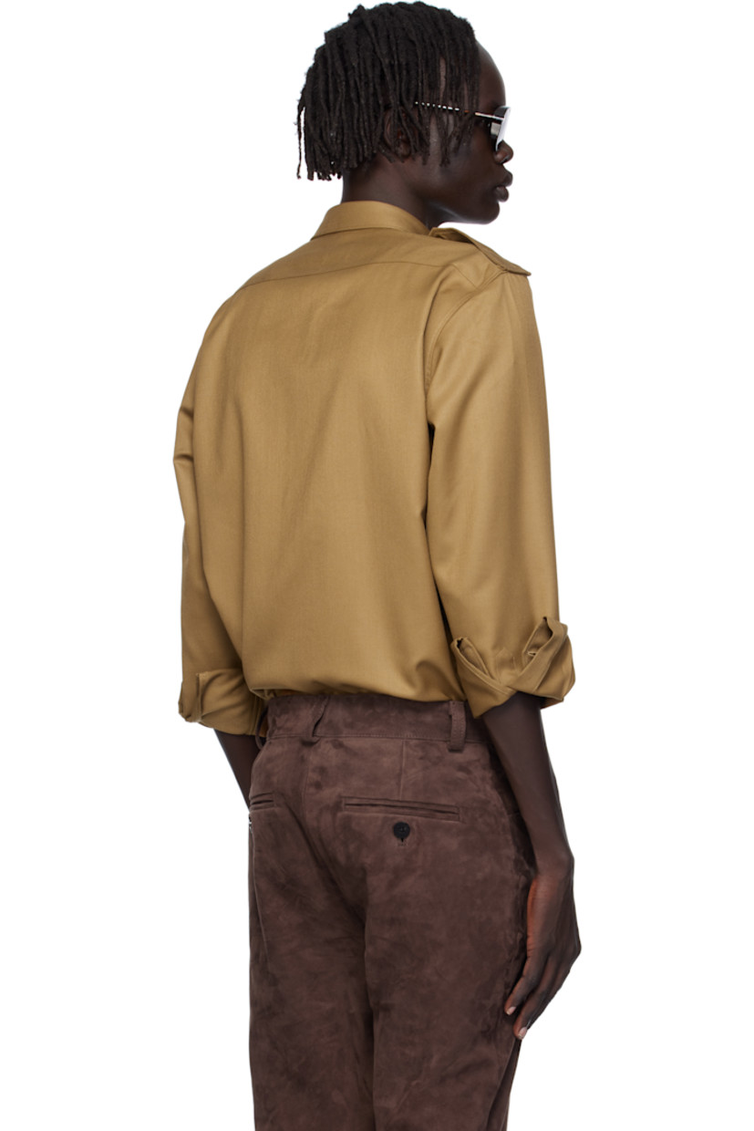 Virgin wool-blend twill overshirt. 

· Spread collar 
· Button closure
· Flap pockets at chest
· Pinched seams at front 
· Shirttail hem 
· Epaulets
· Pleats at buttoned barrel cuffs

Supplier color: Camel