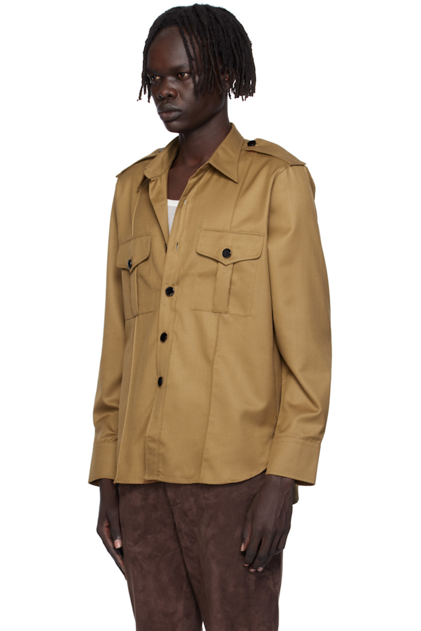 Virgin wool-blend twill overshirt. 

· Spread collar 
· Button closure
· Flap pockets at chest
· Pinched seams at front 
· Shirttail hem 
· Epaulets
· Pleats at buttoned barrel cuffs

Supplier color: Camel