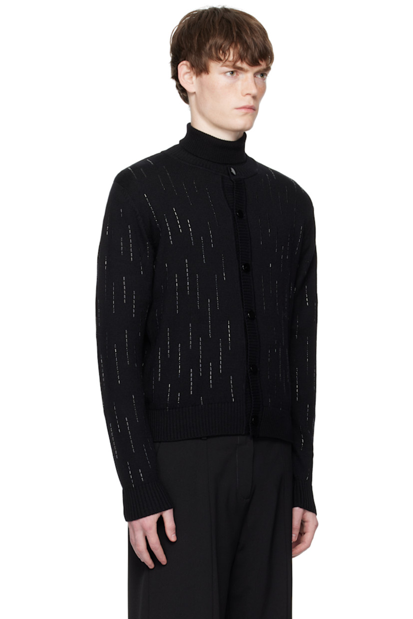 Knit virgin wool cardigan.

· Crystal appliqués throughout
· Rib-knit crewneck, hem, and cuffs
· Button closure

Supplier color: Black Crystal