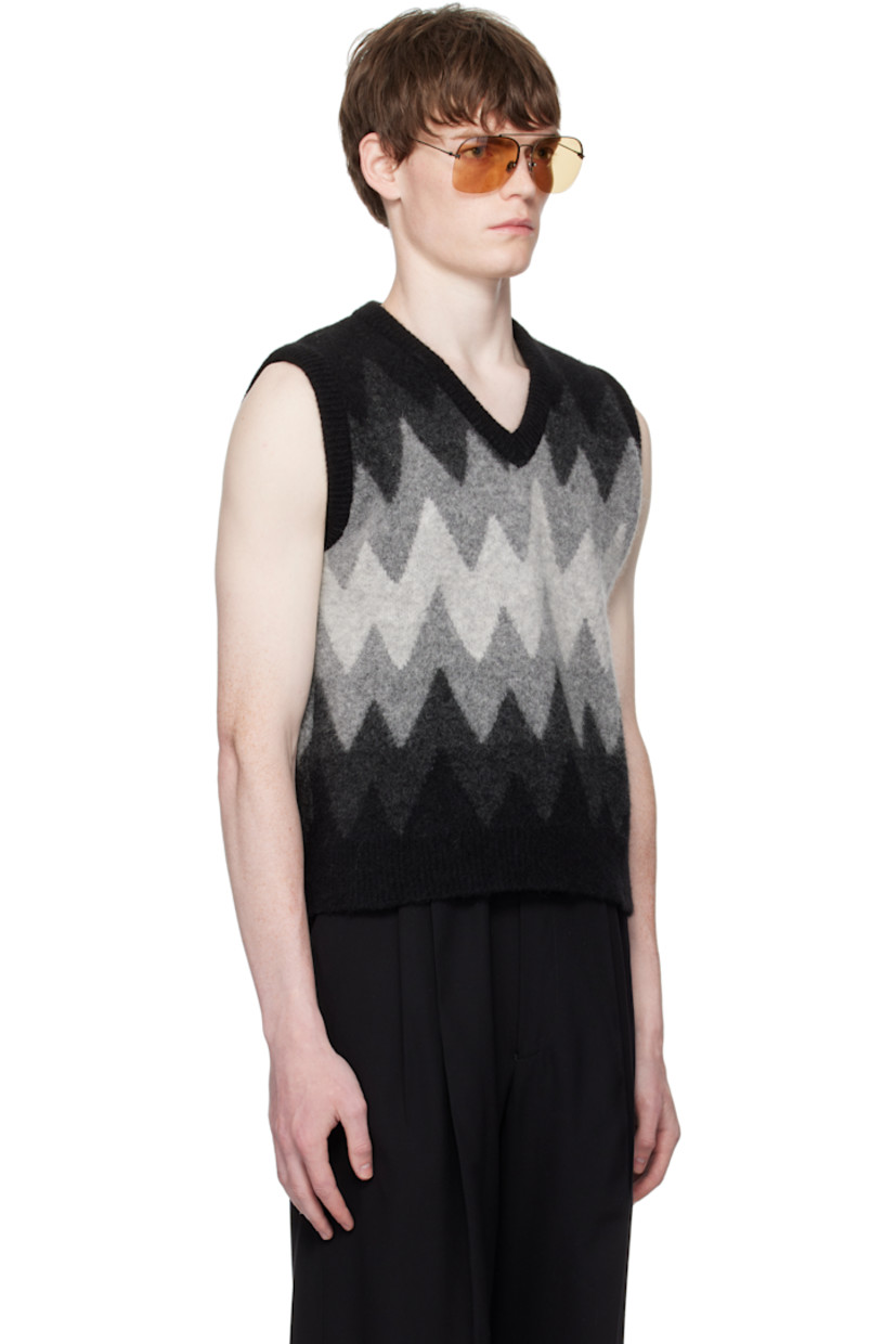 Brushed knit stretch virgin wool-blend vest.

· Jacquard graphic pattern throughout
· Rib-knit V-neck, hem, and armscyes

Supplier color: Black/Grey