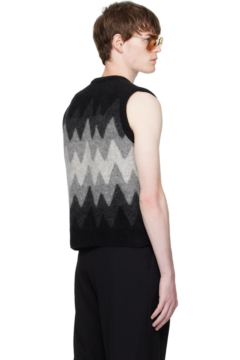 Brushed knit stretch virgin wool-blend vest.

· Jacquard graphic pattern throughout
· Rib-knit V-neck, hem, and armscyes

Supplier color: Black/Grey