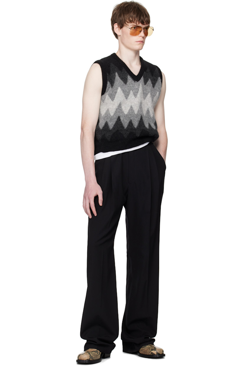 Brushed knit stretch virgin wool-blend vest.

· Jacquard graphic pattern throughout
· Rib-knit V-neck, hem, and armscyes

Supplier color: Black/Grey