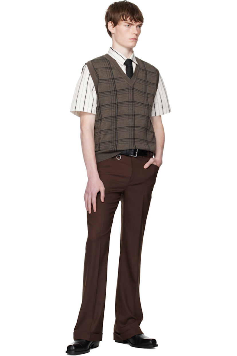 Knit extrafine merino wool-blend vest. 

· Jacquard check pattern throughout
· Rib-knit V-neck, hem, and armscyes

Supplier color: Brown/Black