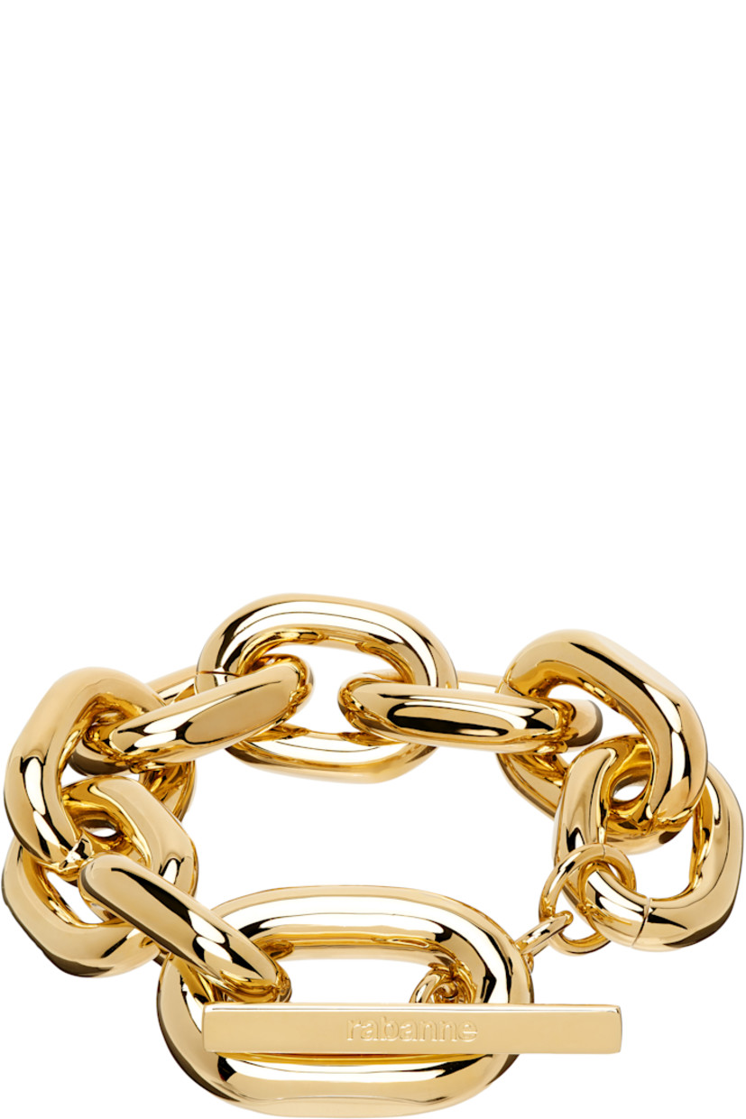 Cable chain bracelet in gold-tone brass.

· Logo-engraved toggle fastening
· L9"

Supplier color: Gold
