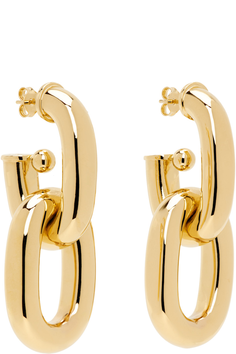 Pair of drop earrings in gold-tone brass.

· Chain link at drop
· Post-stud fastening
· H2.25" x W0.75"

Supplier color: Gold