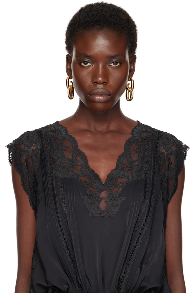 Pair of drop earrings in gold-tone brass.

· Chain link at drop
· Post-stud fastening
· H2.25" x W0.75"

Supplier color: Gold