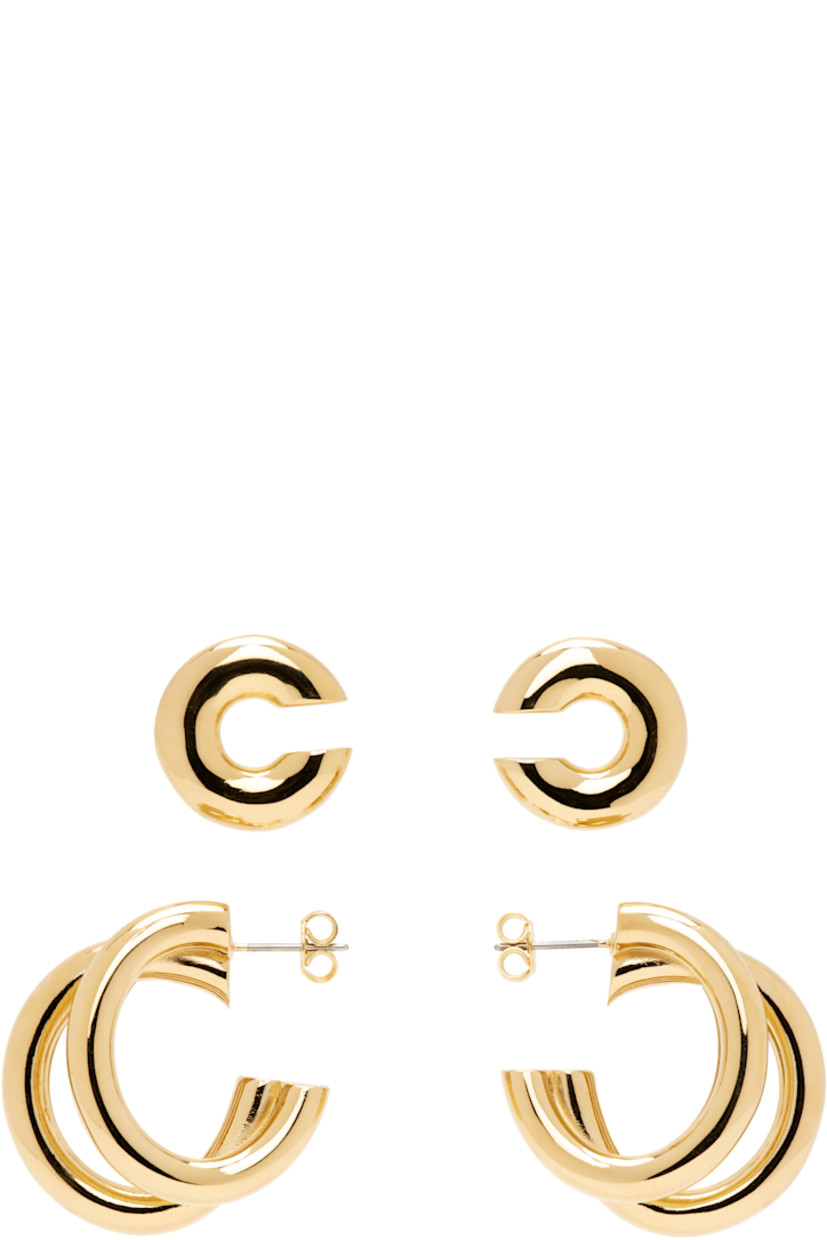 Set of open hoop earrings and ear cuffs in gold-tone brass. 

�· Twisted detailing at open hoop 
· Post-stud fastening 
· Open hoop: D1" 
· Ear cuff: D0.5"

Supplier color: Gold