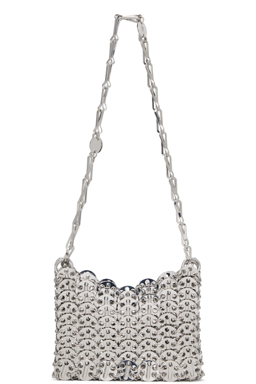 Handcrafted chain-mail-style shoulder bag in silver-tone brass.

· Sliding chain-link shoulder straps
· Logo plaque at shoulder strap
· Open throat
· Unlined
· H4" x W6" x D1"

Supplier color: Silver