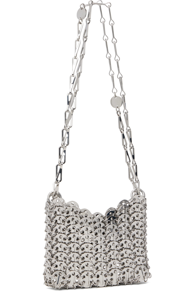 Handcrafted chain-mail-style shoulder bag in silver-tone brass.

· Sliding chain-link shoulder straps
· Logo plaque at shoulder strap
· Open throat
· Unlined
· H4" x W6" x D1"

Supplier color: Silver