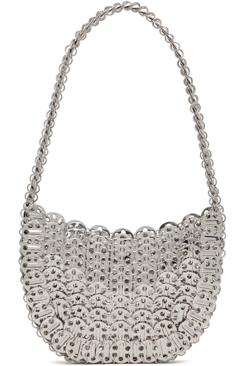 Handcrafted chain-mail-style shoulder bag in silver-tone brass.

· Fixed shoulder strap
· Open throat
· Unlined
· H5" x W7" x D1"

Supplier color: Silver