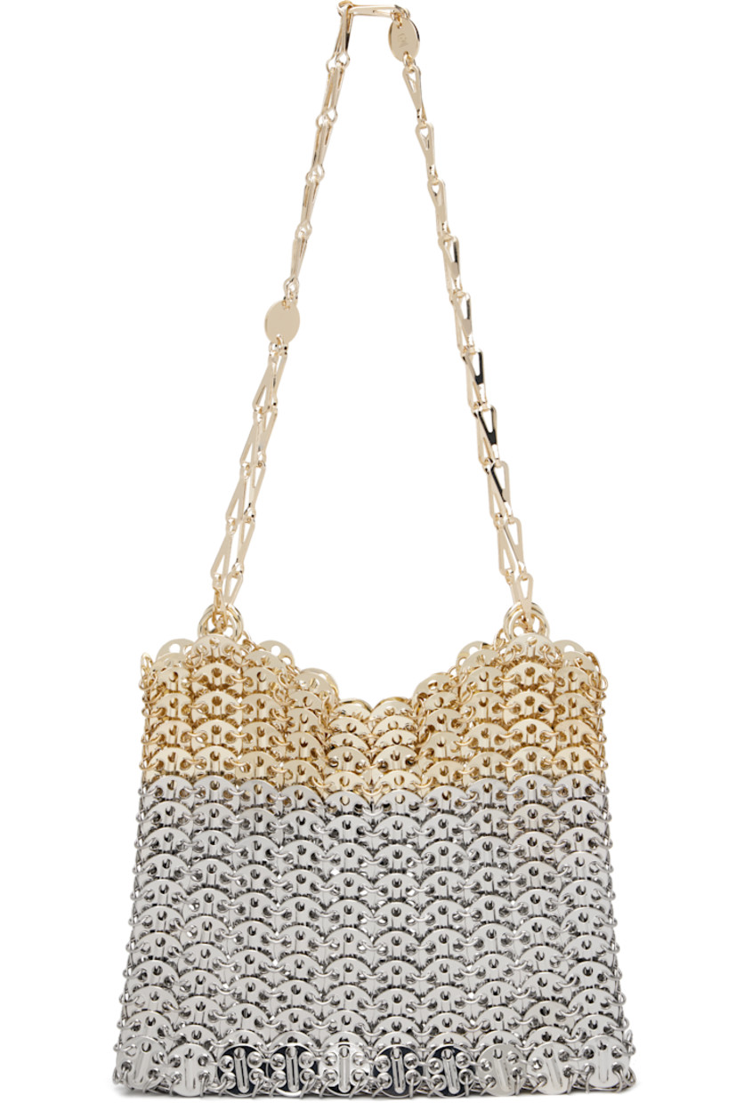Handcrafted chain-mail-style shoulder bag in silver- and gold-tone brass.

· Sliding chain-link shoulder straps
· Logo plaque at shoulder strap
· Open throat
· Unlined
· H7" x W9" x D1"

Supplier color: Silver/Light gold