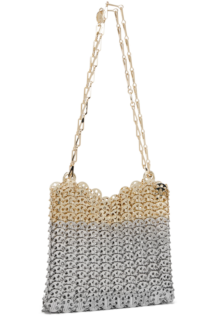 Handcrafted chain-mail-style shoulder bag in silver- and gold-tone brass.

· Sliding chain-link shoulder straps
· Logo plaque at shoulder strap
· Open throat
· Unlined
· H7" x W9" x D1"

Supplier color: Silver/Light gold