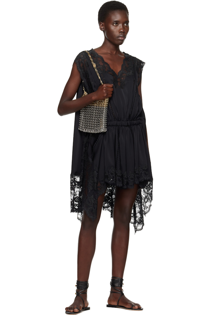 Handcrafted chain-mail-style shoulder bag in silver- and gold-tone brass.

· Sliding chain-link shoulder straps
· Logo plaque at shoulder strap
· Open throat
· Unlined
· H7" x W9" x D1"

Supplier color: Silver/Light gold