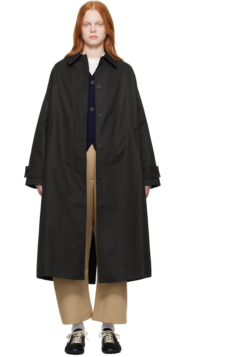Lightweight cotton-blend gabardine trench coat.

· Water-repellent
· Hook-eye fastening at spread collar
· Concealed button closure
· Welt pockets
· Raglan sleeves
· Adjustable button tab at cuffs
· Central vent at back hem
· Patch pocket at interior
· Full twill lining

Supplier color: Dark navy