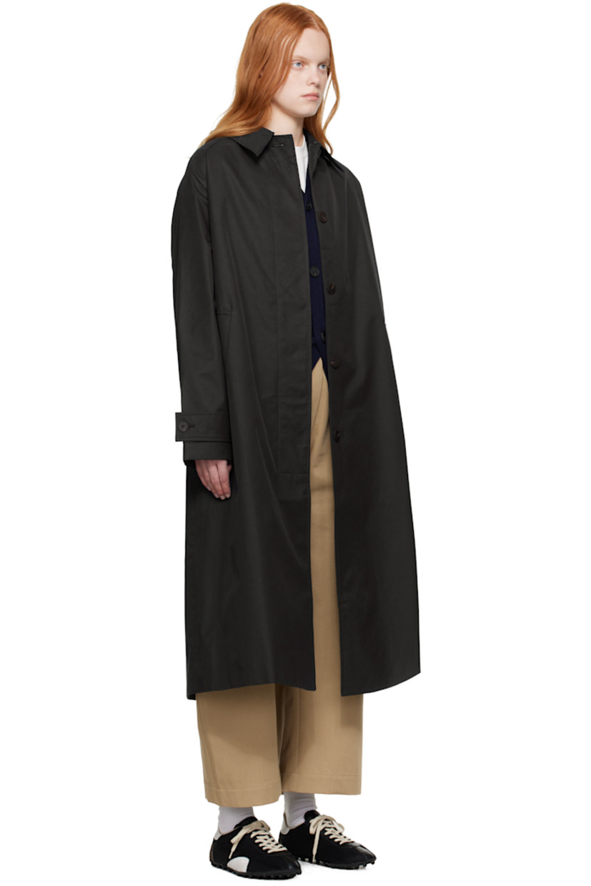 Lightweight cotton-blend gabardine trench coat.

· Water-repellent
· Hook-eye fastening at spread collar
· Concealed button closure
· Welt pockets
· Raglan sleeves
· Adjustable button tab at cuffs
· Central vent at back hem
· Patch pocket at interior
· Full twill lining

Supplier color: Dark navy